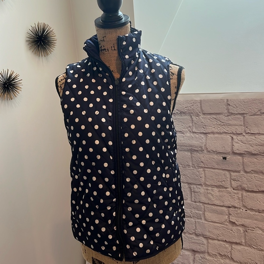 Navy blue and white poka dot puffer vest reversible